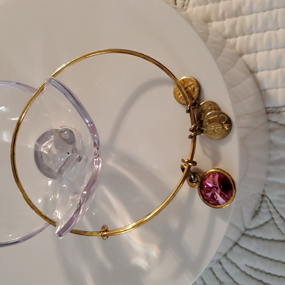 Alex and Ani EWB with pink Swarovski crystal in shiny golden metal